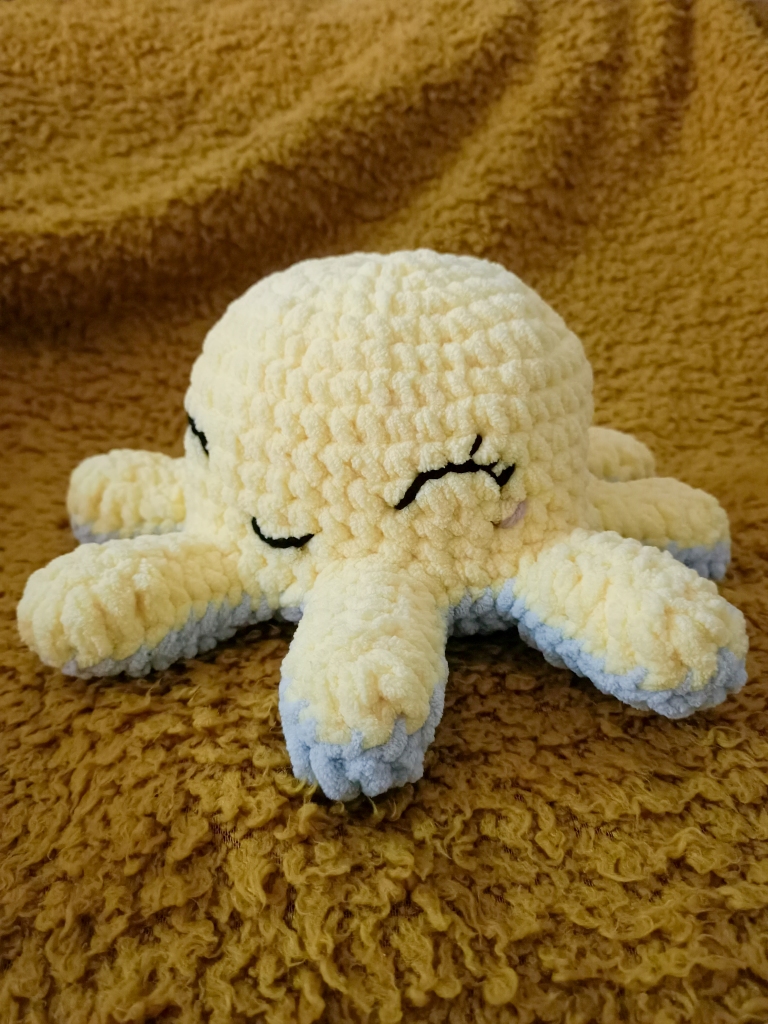 crocheted reversible octopus in yellow