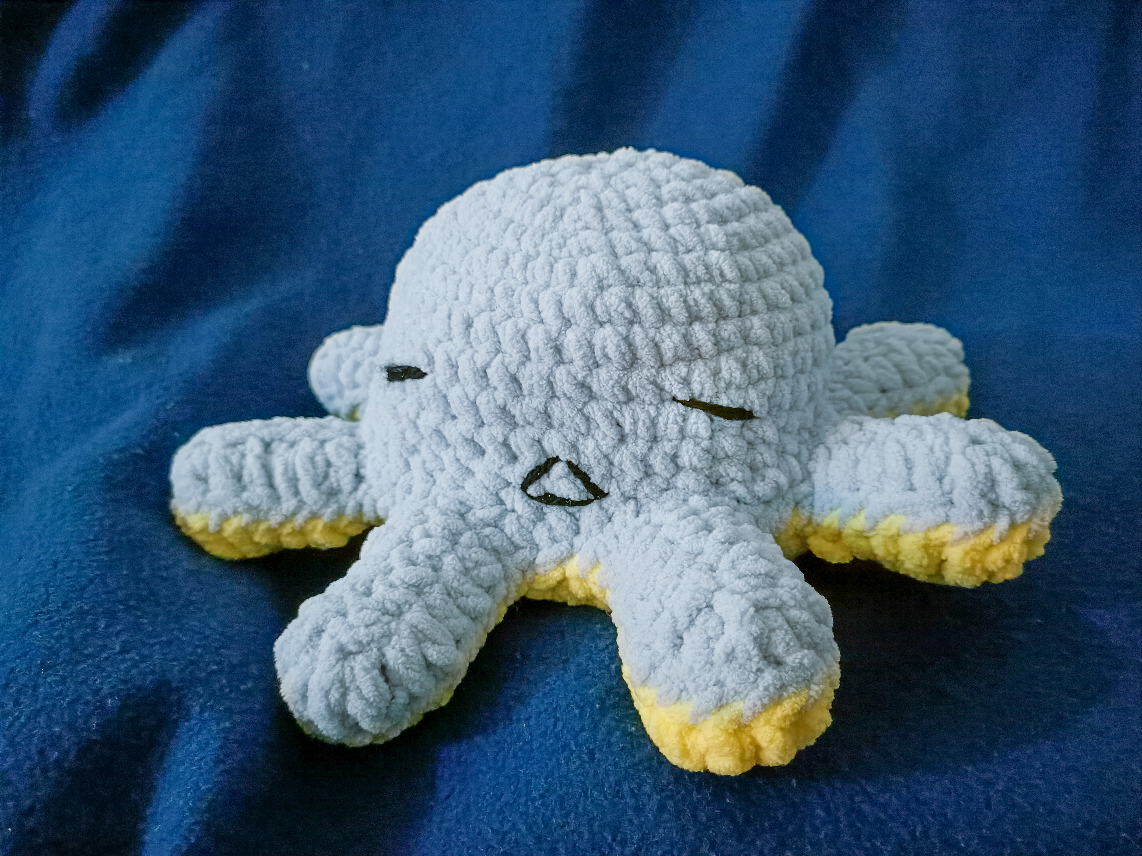 crocheted reversible octopus in blue