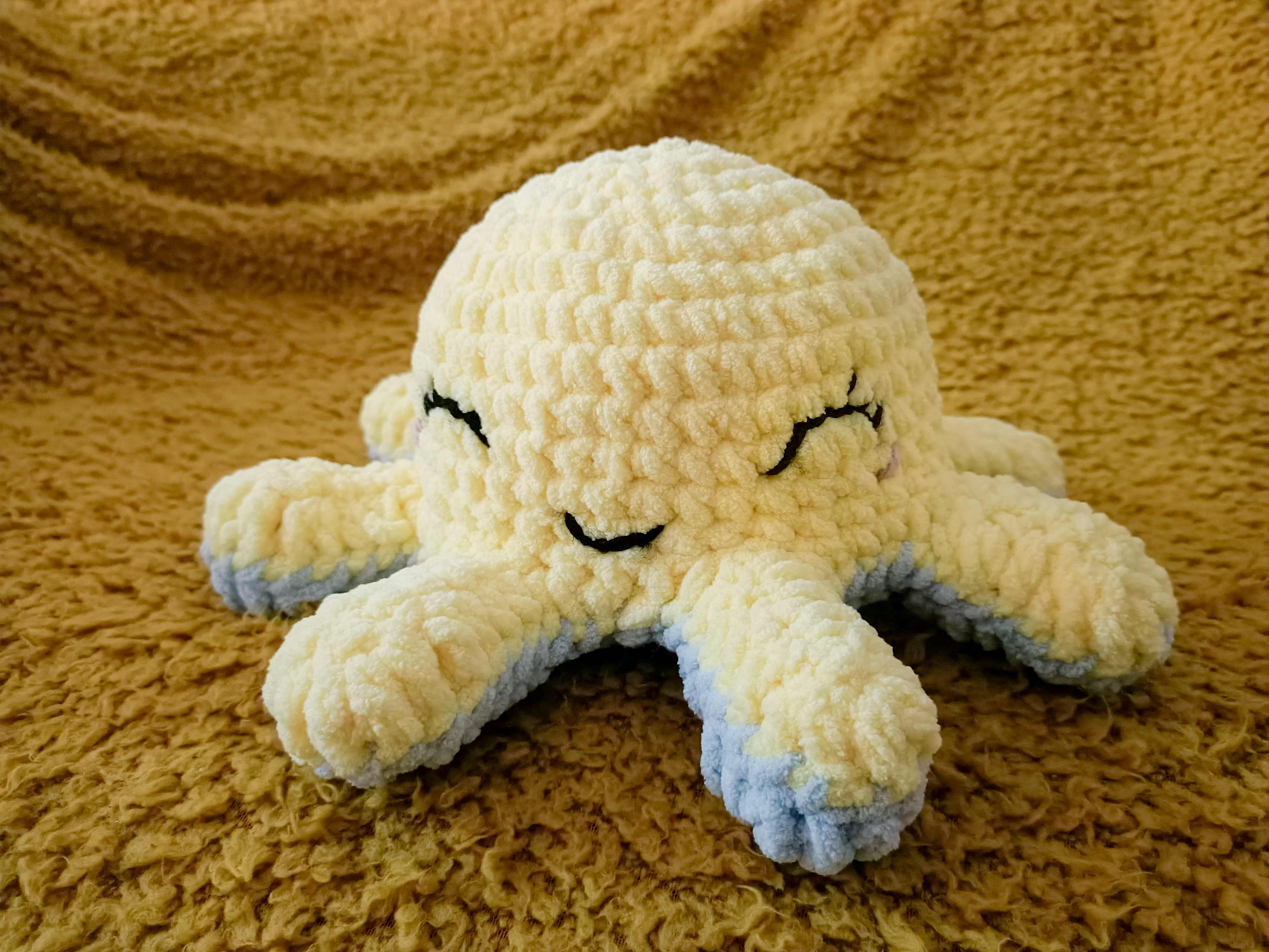 crocheted reversible octopus in yellow